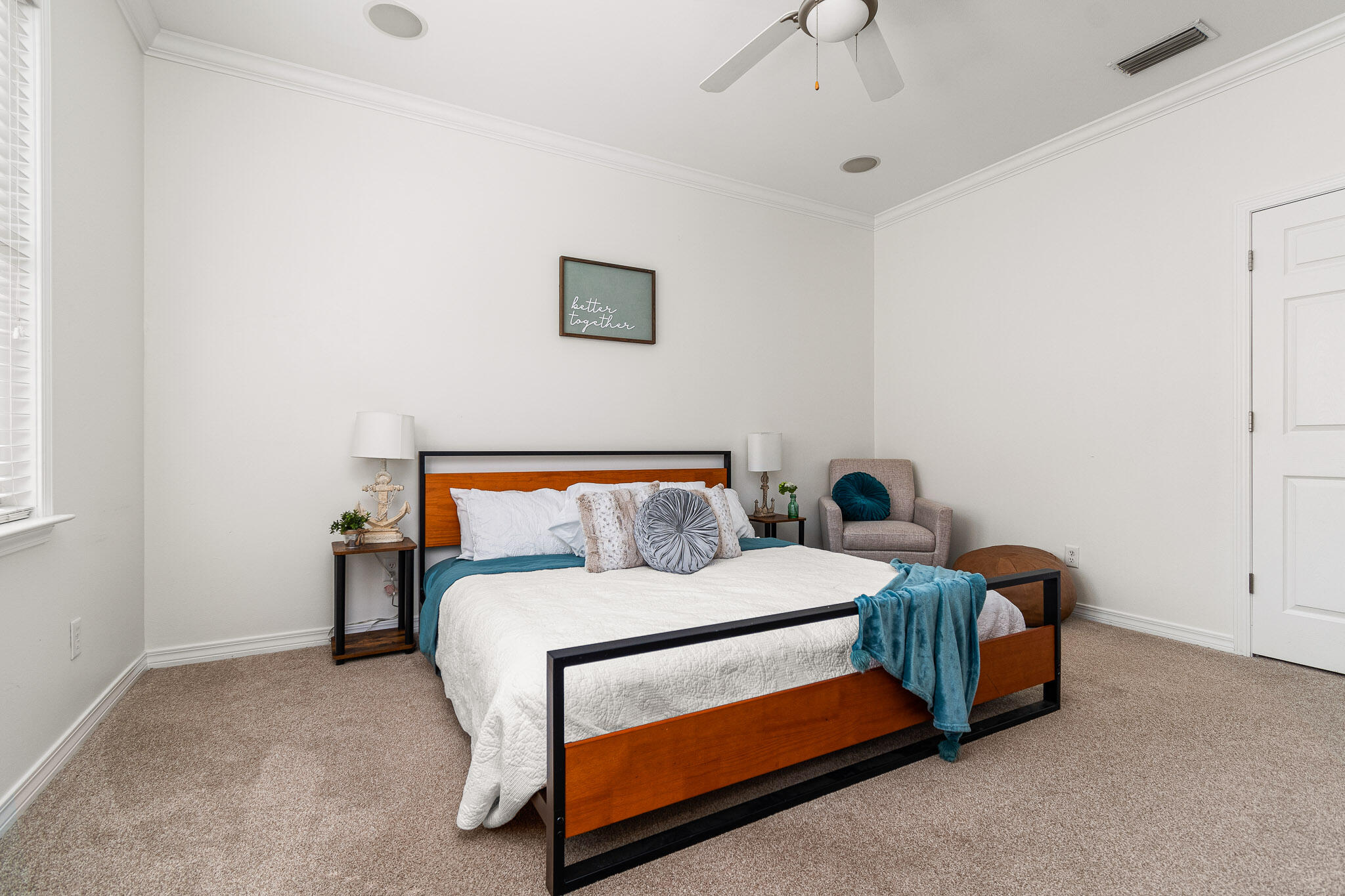 227 Inverrary Drive Destin, FL 32541 - Photo 38 of 50 a bedroom with a bed and a ceiling fan