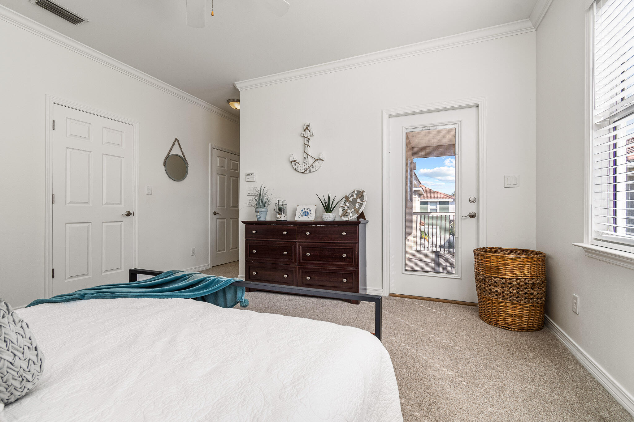 227 Inverrary Drive Destin, FL 32541 - Photo 39 of 50 a bedroom with a bed and a dresser