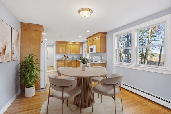 88 Wright Road Concord, MA 01742 - Photo 11 of 42 a view of a dining room with furniture window and outside view