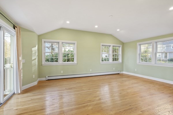 88 Wright Road Concord, MA 01742 - Photo 15 of 42 an empty room with wooden floor and windows