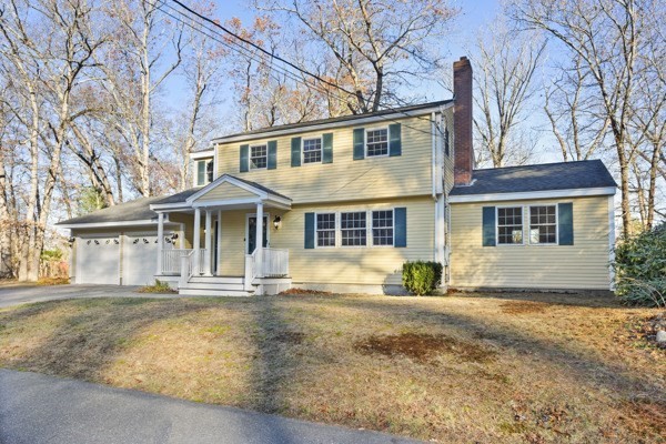 88 Wright Road Concord, MA 01742 - Photo 2 of 42 a front view of a house with a yard