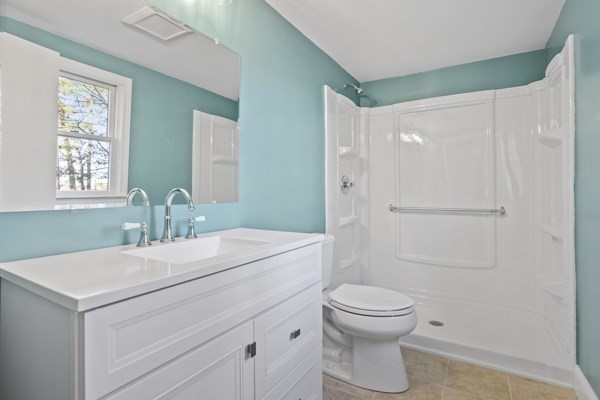 88 Wright Road Concord, MA 01742 - Photo 24 of 42 a bathroom with a sink a toilet and shower