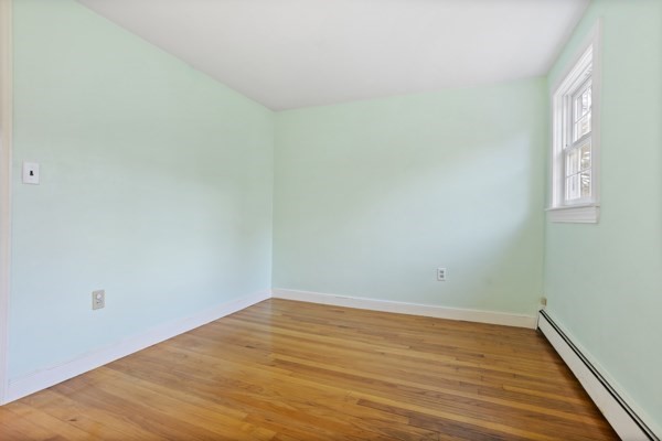 88 Wright Road Concord, MA 01742 - Photo 30 of 42 a view of empty room with wooden floor