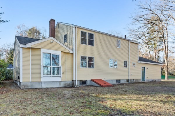 88 Wright Road Concord, MA 01742 - Photo 34 of 42 a view of a house with a yard