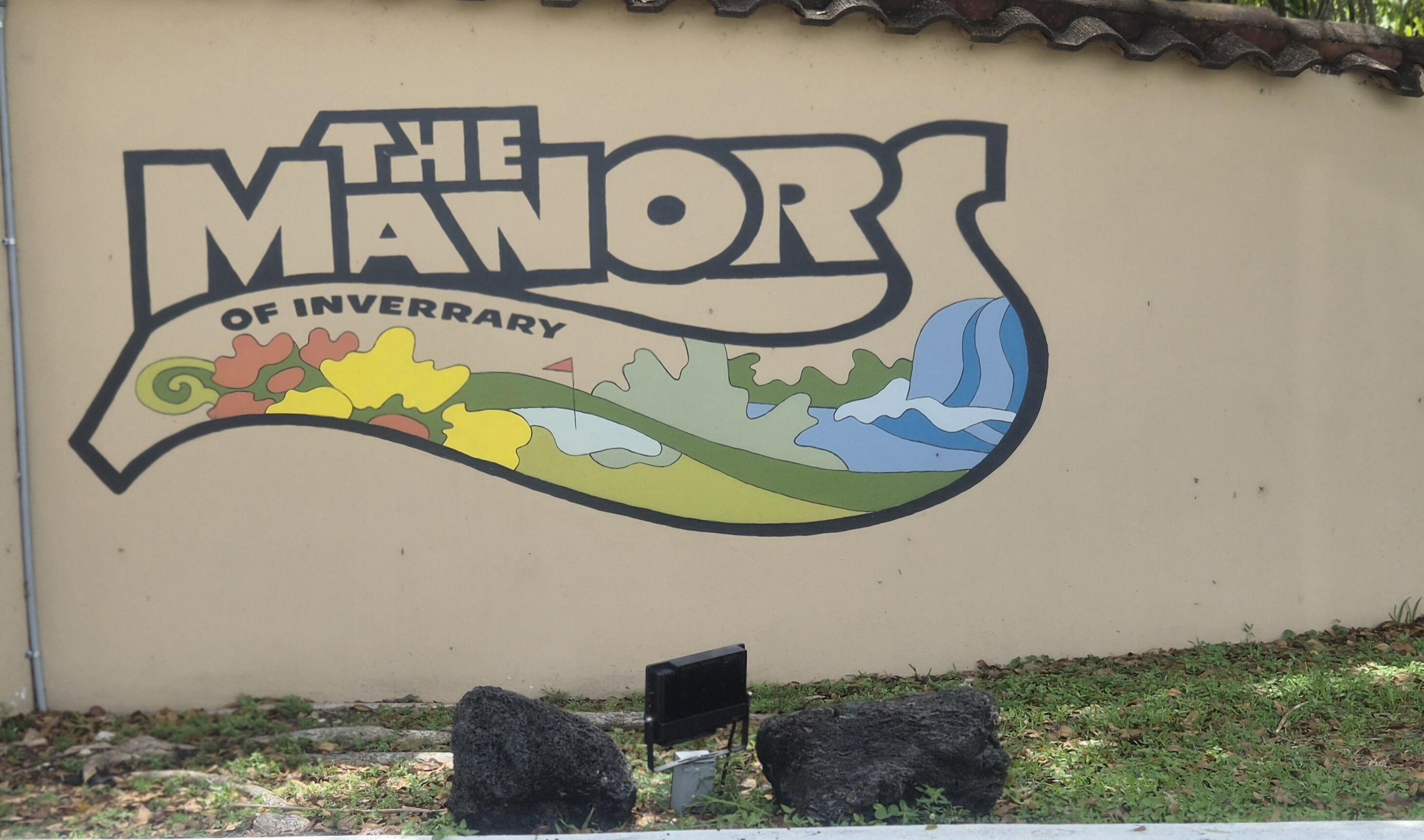 a view of a swimming pool with a backyard