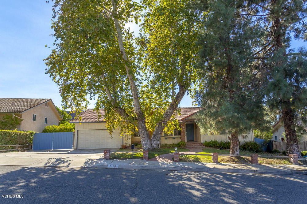 1168 Rambling Road Simi Valley, CA 93065 - Photo 1 of 45 a view of road with large trees