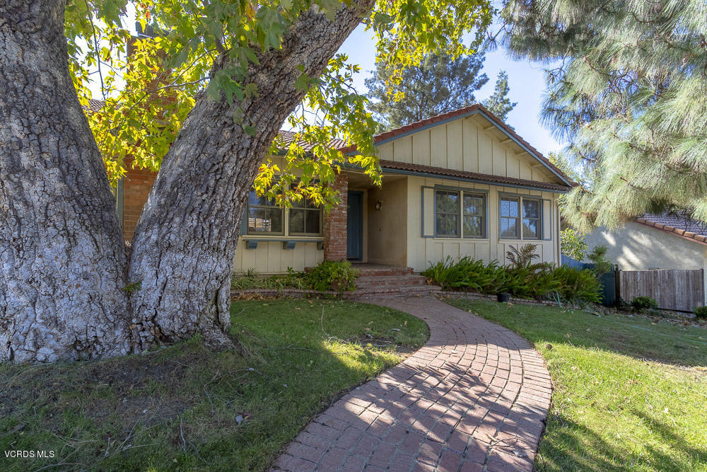 1168 Rambling Road Simi Valley, CA 93065 - Photo 2 of 45 a front view of house with a garden