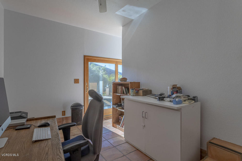 1168 Rambling Road Simi Valley, CA 93065 - Photo 17 of 45 a view of a workspace with furniture and a window