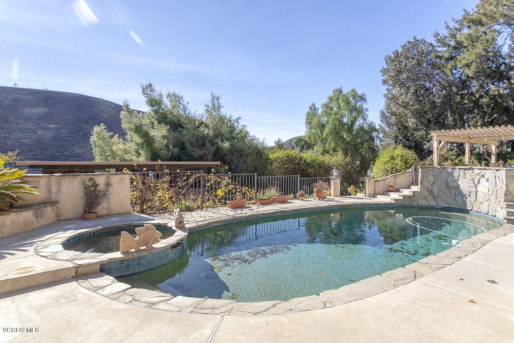 1168 Rambling Road Simi Valley, CA 93065 - Photo 27 of 45 a view of a swimming pool with a patio