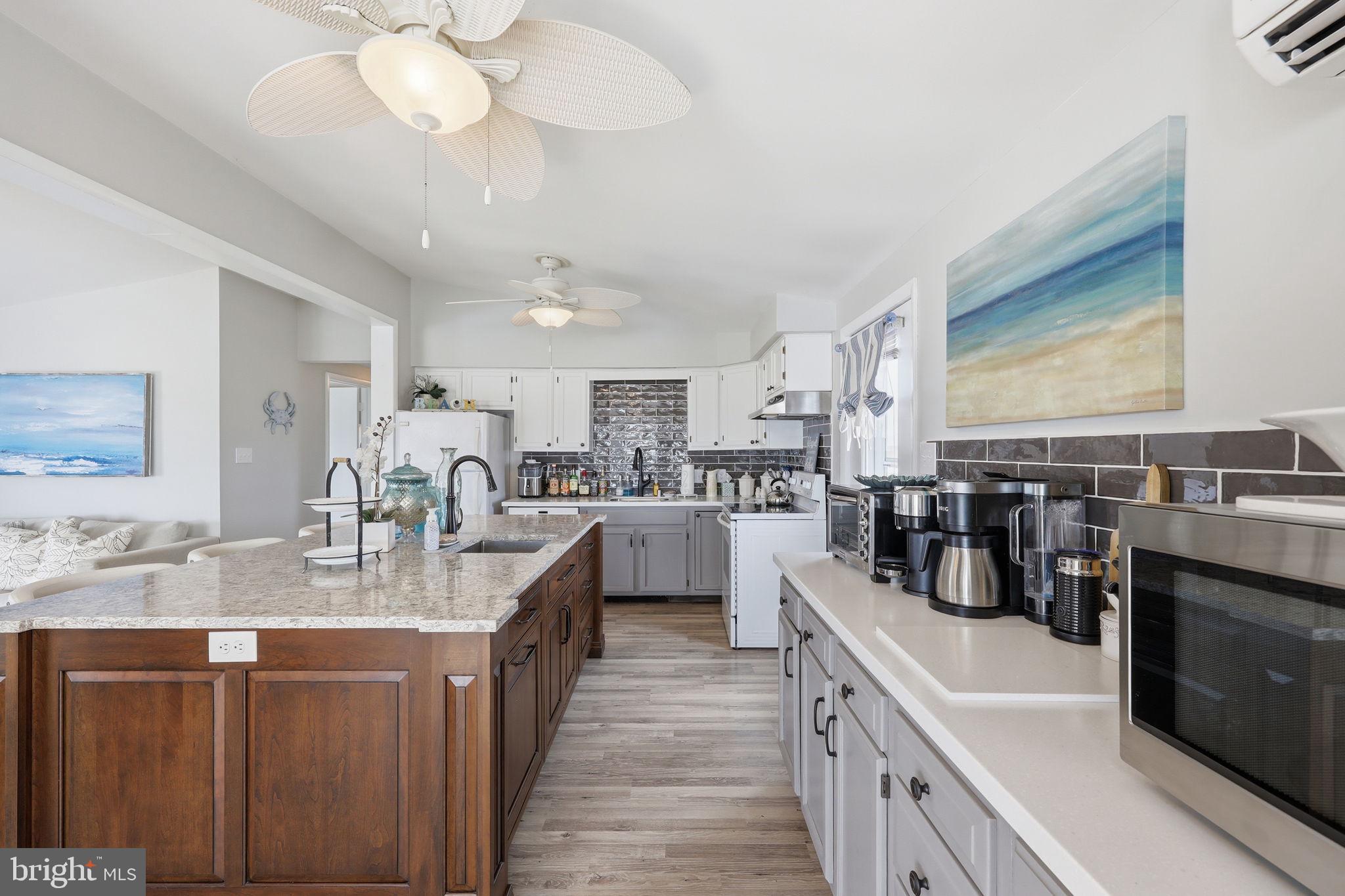 173 Cove Road Newport, NJ 08345 - Photo 14 of 72 a large kitchen with a lot of counter space and stainless steel appliances