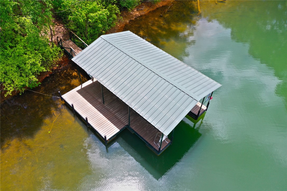 Lot 114 Harbor Point Seneca, SC 29672 - Photo 19 of 46 This private dock with a covered slip offers direct access to the tranquil lake.
