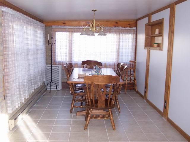205 Cedar Road Effort, PA 18330 - Photo 3 of 7 a dining room with furniture and window