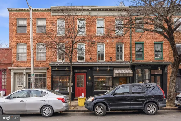 a car parked in front of a building