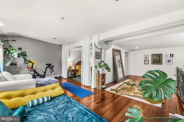 a bedroom with furniture and a couch