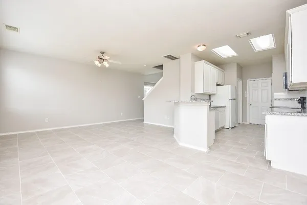 a view of a kitchen with a sink