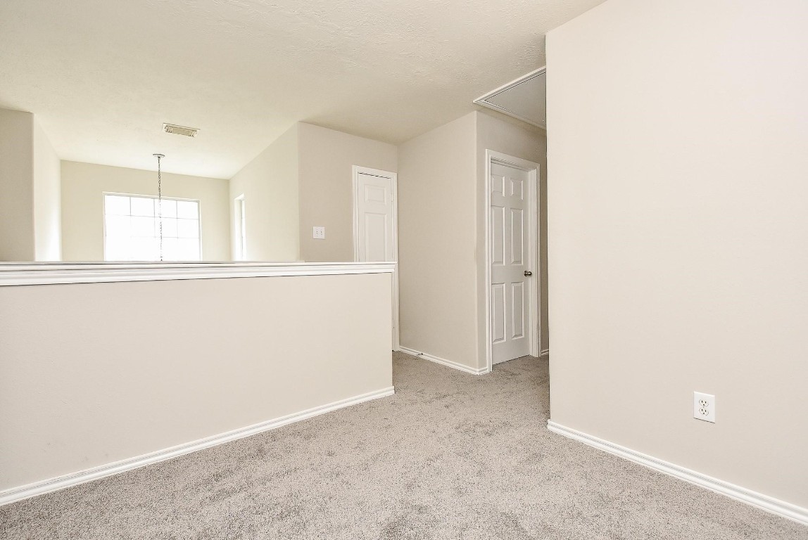 5619 Stonecloud Lane Katy, TX 77494 - Photo 22 of 31 an empty room with a window