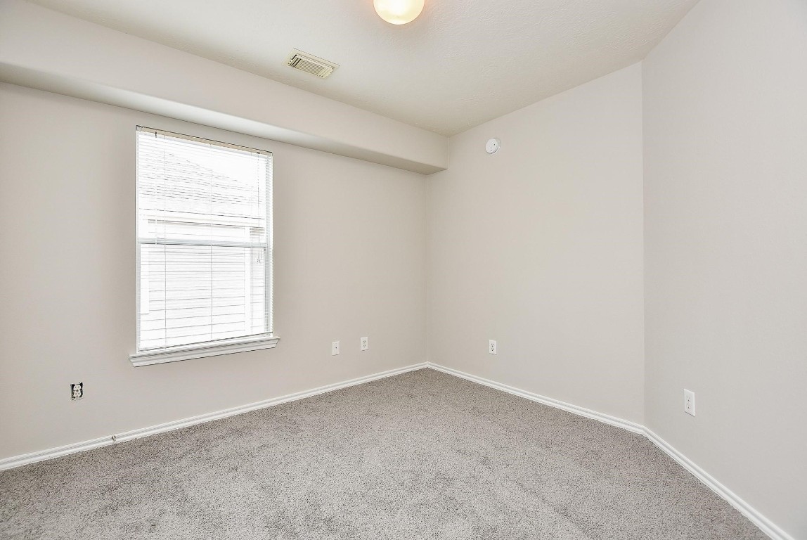 5619 Stonecloud Lane Katy, TX 77494 - Photo 24 of 31 an empty room with a window