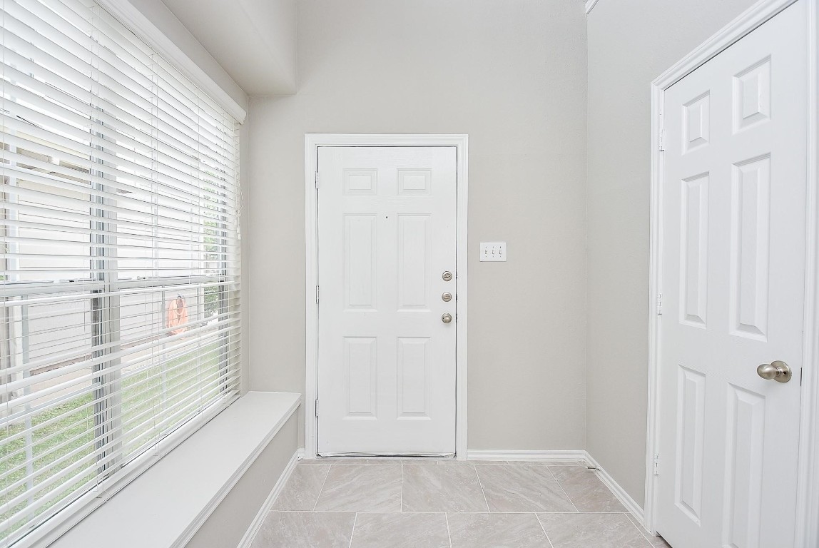 5619 Stonecloud Lane Katy, TX 77494 - Photo 3 of 31 a view of a bathroom with a tub and windows