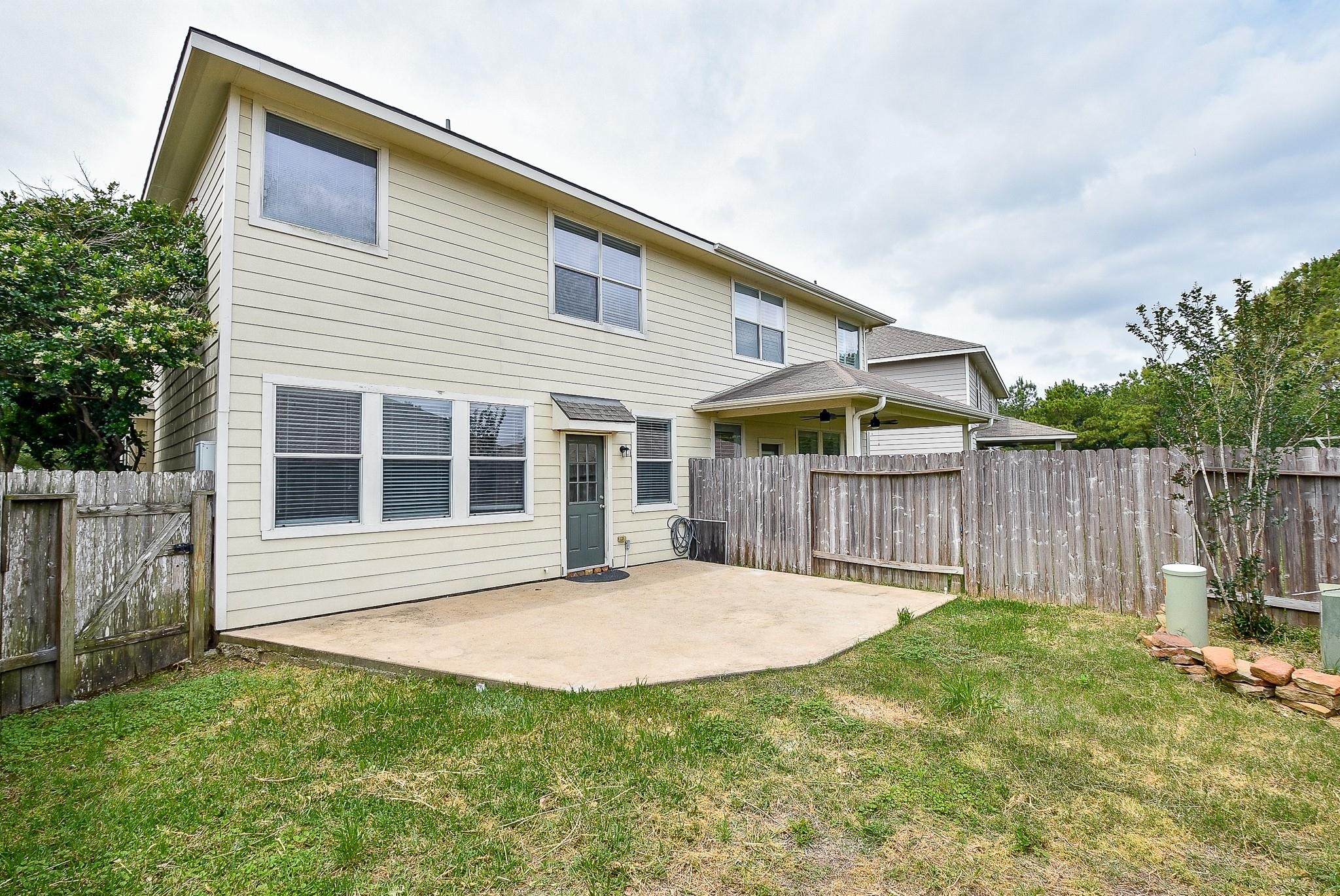 5619 Stonecloud Lane Katy, TX 77494 - Photo 31 of 31 a front view of house with a garden