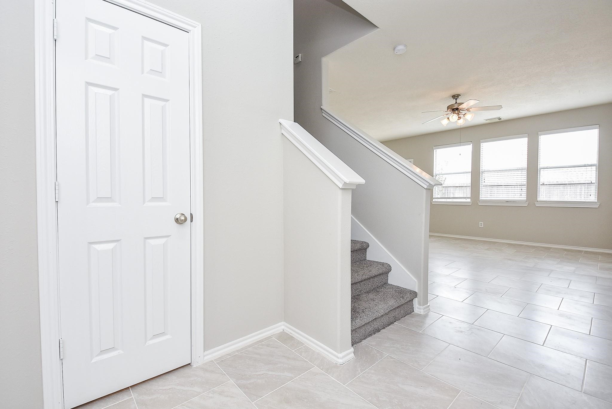5619 Stonecloud Lane Katy, TX 77494 - Photo 4 of 31 an entryway in a hall with a window