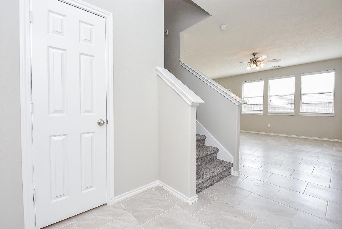 5619 Stonecloud Lane Katy, TX 77494 - Photo 4 of 31 an entryway in a hall with a window