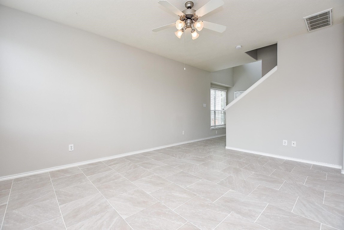 5619 Stonecloud Lane Katy, TX 77494 - Photo 7 of 31 a view of an empty room with a window