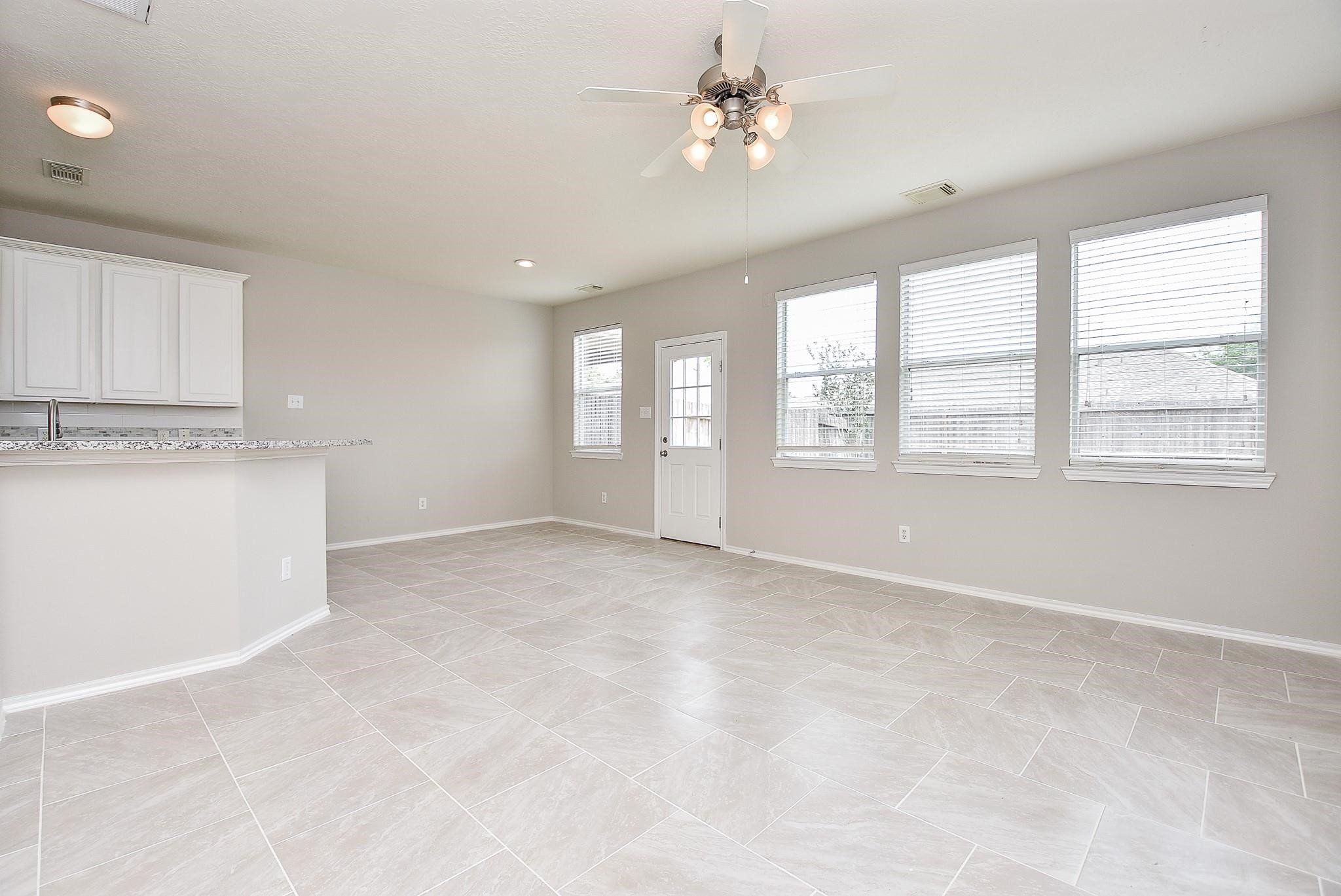 5619 Stonecloud Lane Katy, TX 77494 - Photo 9 of 31 a view of an empty room with a window