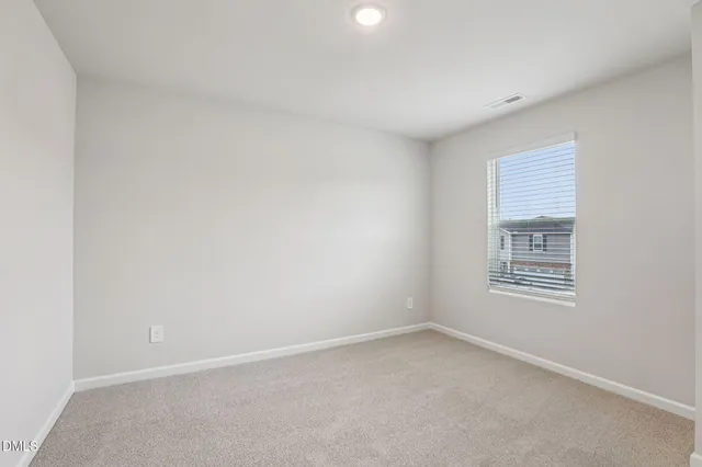 a bathroom with a sink a mirror and a mirror
