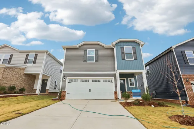 a black and white photo of a living room