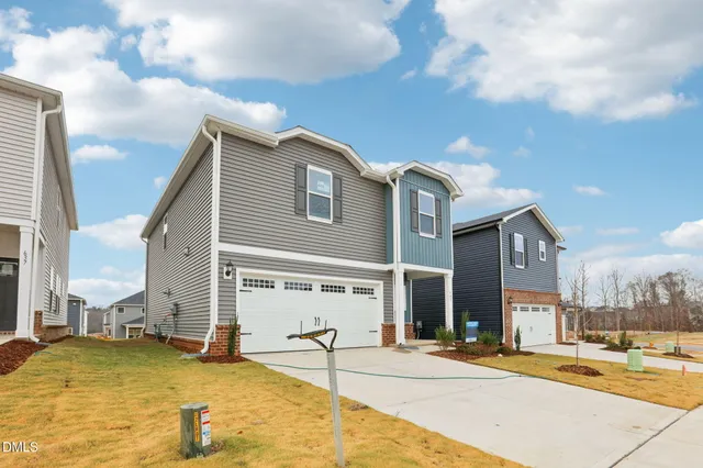 a front view of a house with swimming pool