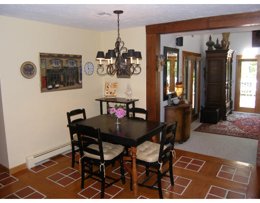 18 Parmenter Road Framingham, MA 01701 - Photo 11 of 18 a view of a dining room with furniture and chandelier