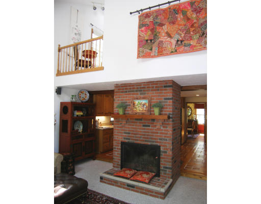 18 Parmenter Road Framingham, MA 01701 - Photo 13 of 18 a living room with furniture and a fireplace