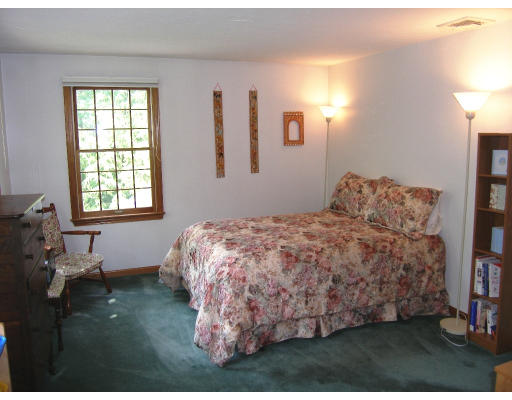 18 Parmenter Road Framingham, MA 01701 - Photo 17 of 18 a bedroom with a bed and a window