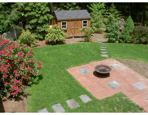 18 Parmenter Road Framingham, MA 01701 - Photo 5 of 18 a view of a backyard with garden and patio