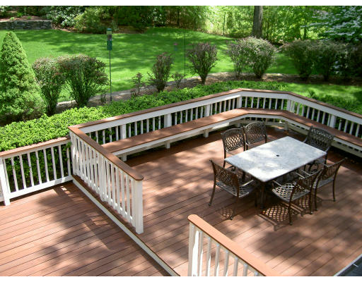 18 Parmenter Road Framingham, MA 01701 - Photo 6 of 18 a view of a chairs and table on the deck