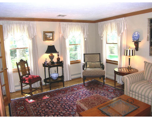 18 Parmenter Road Framingham, MA 01701 - Photo 8 of 18 a living room with furniture and a window