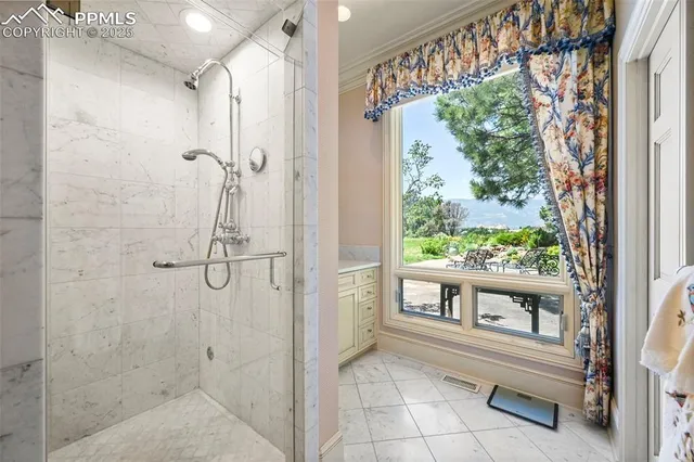 a view of a hallway with windows