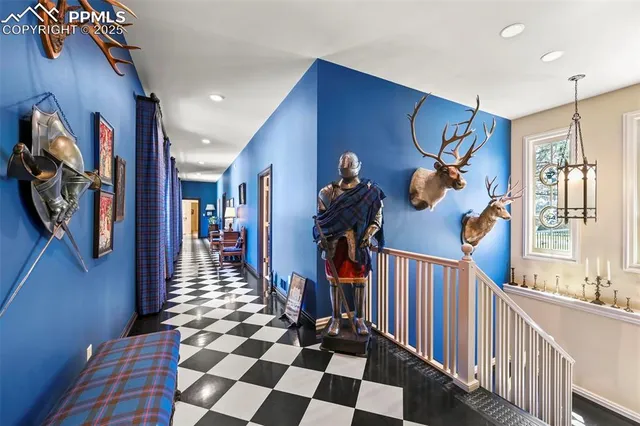 a large kitchen with stainless steel appliances lots of counter space and wooden floor