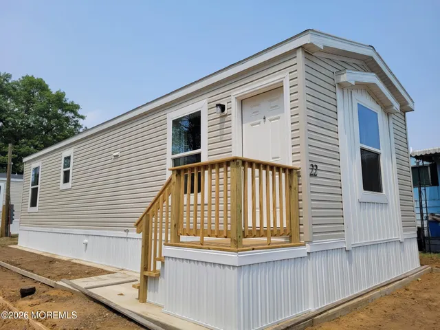 a front view of a house with a porch