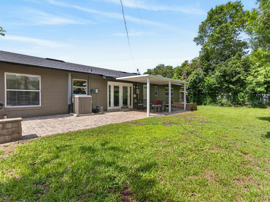 2803 Banchory Road Winter Park, FL 32792 - Photo 24 of 31 a view of a house with backyard and porch