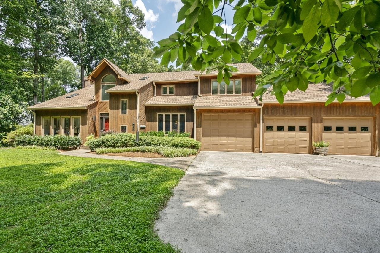 1932 Partridge Berry Drive Raleigh, NC 27606 - Photo 2 of 30 A Private Setting on a .92 Acre Lot