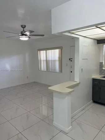 a bathroom with a sink a vanity and a mirror