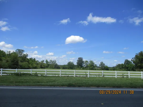 a view of a golf course with a lake