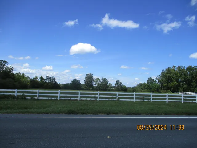 a view of a golf course with a lake view