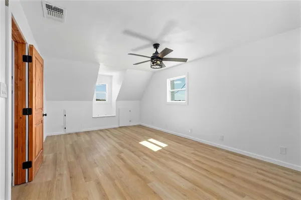 a bathroom with a toilet a sink and bathtub