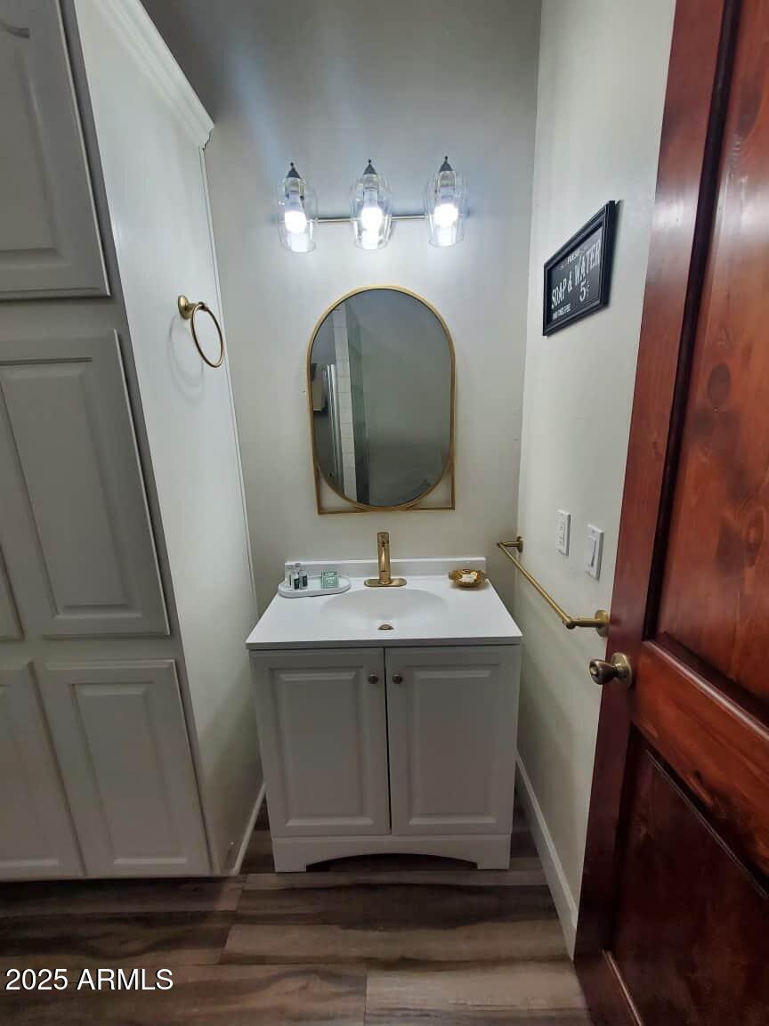 9755 Dike Road Mohave Valley, AZ 86440 - Photo 25 of 50 a bathroom with a sink and a mirror