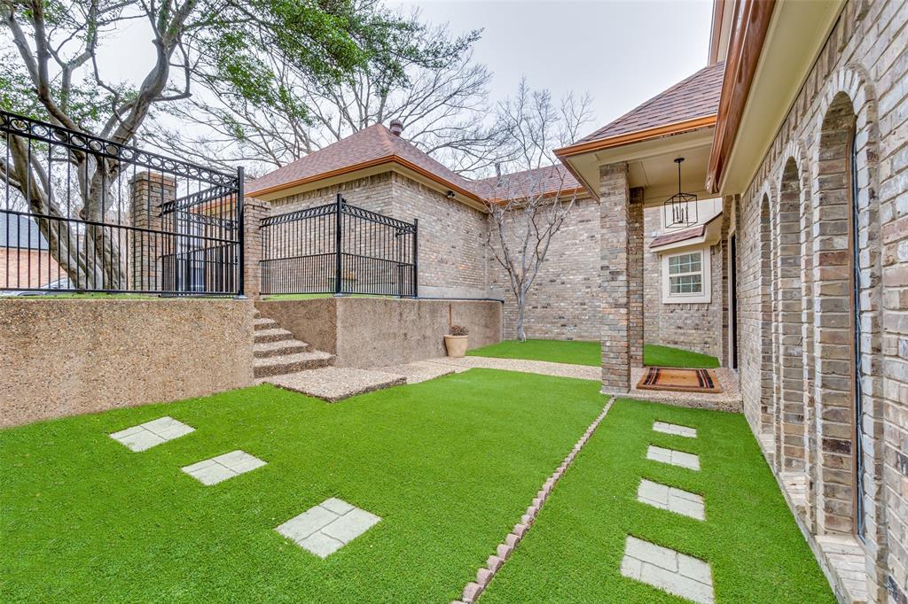 9130 Valley Chapel Lane Dallas, TX 75220 - Photo 4 of 39 a view of a backyard with a garden