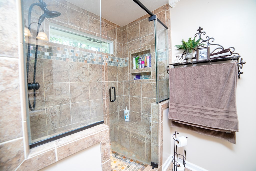 8750 D Warm Springs Road Midland, GA 31820 - Photo 20 of 44 Walk in tiled shower with bench