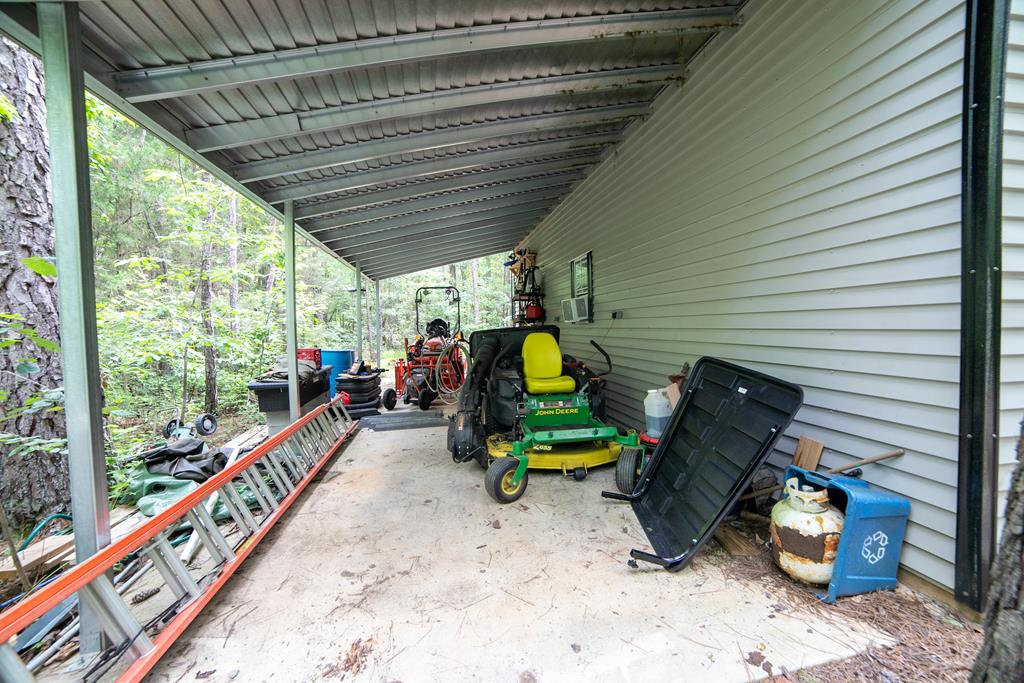 8750 D Warm Springs Road Midland, GA 31820 - Photo 38 of 44 Covered area outside of workshop