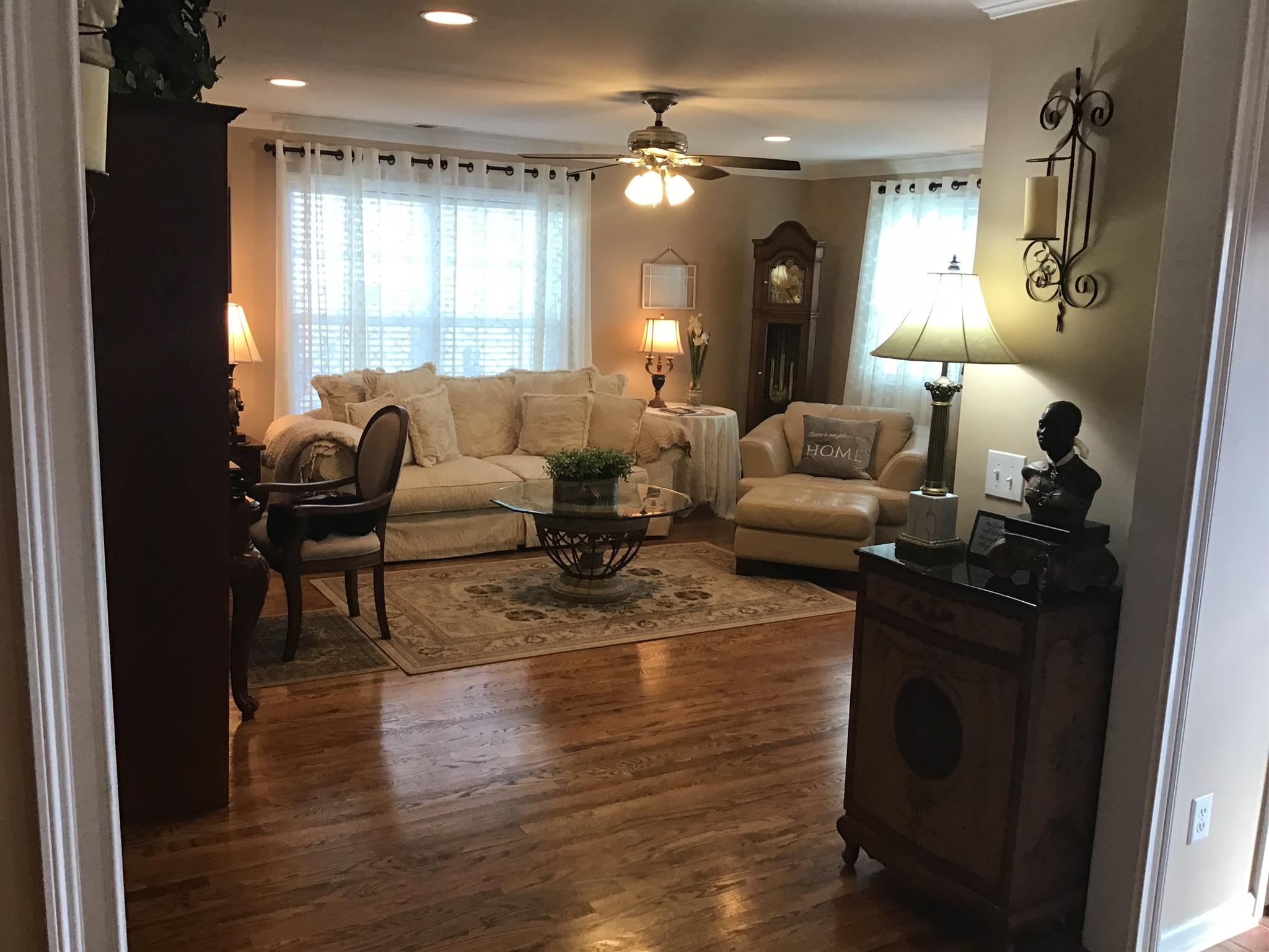 1108 Paris Avenue Nashville, TN 37204 - Photo 14 of 30 a living room with furniture and a chandelier